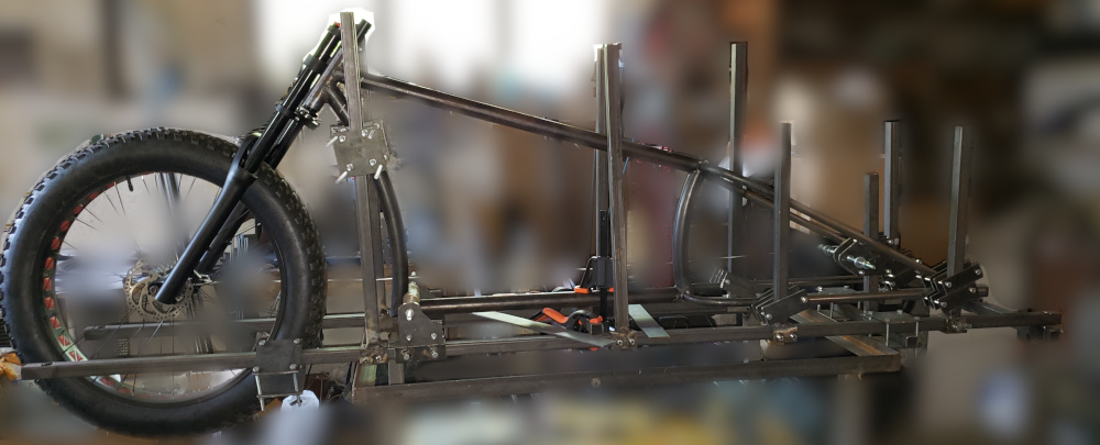 Fat Saddle custom bike frame in the jig